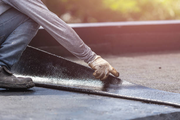 Professional Basement Waterproofing technician working in Marietta, NY
